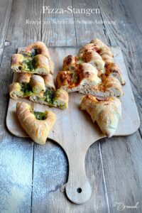 Pizza-Stangen mit Füllung Pizza-Stangen füllen: Mit Pesto, Tomatensauce und Käse für den perfekten Snack oder Mahlzeit.